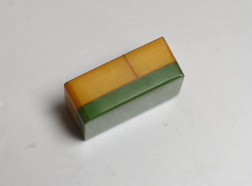 A leather cased Bakelite mahjong set